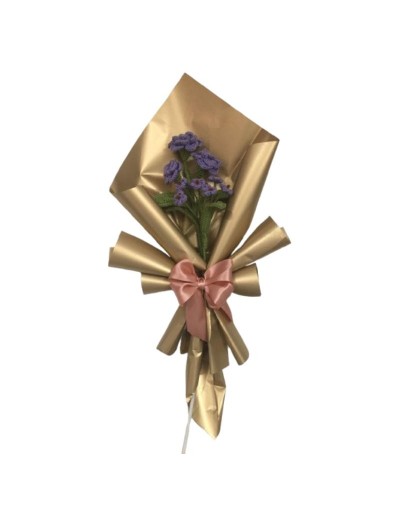 Arreglo floral tejido rosas moradas