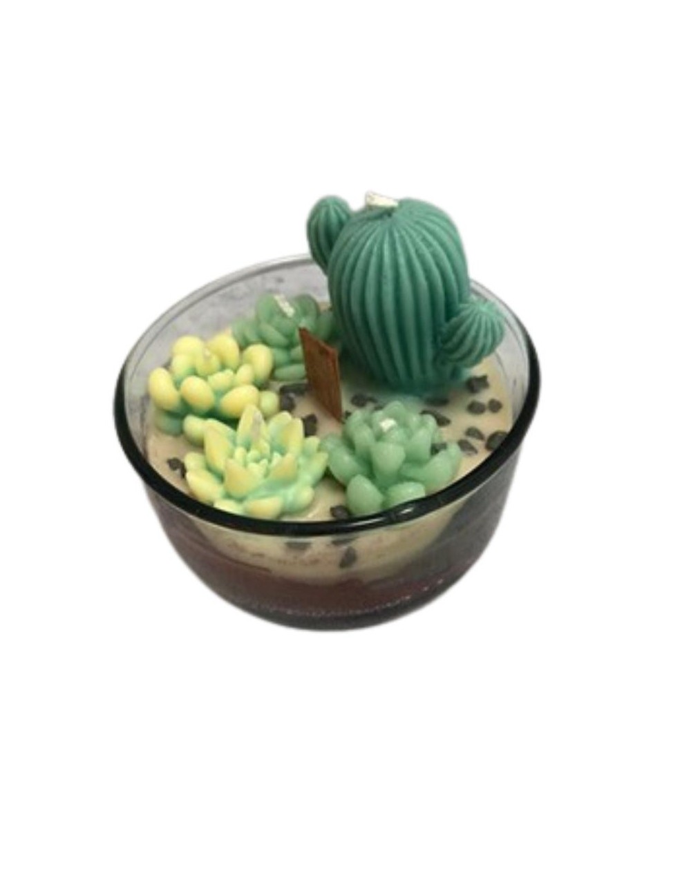 vela en envase de vidrio con figuras