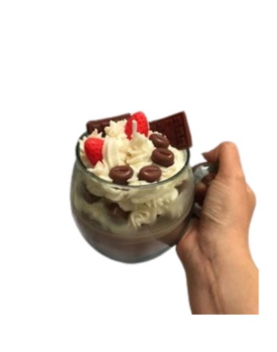 vela en envase de vidrio tipo postre