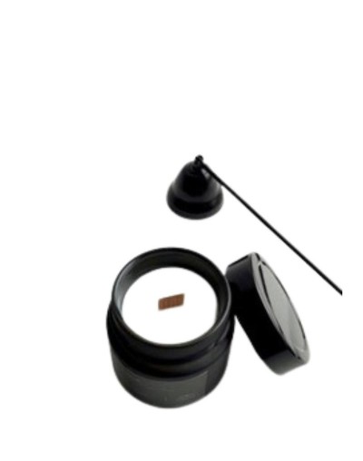 vela en envase de vidrio con tapa