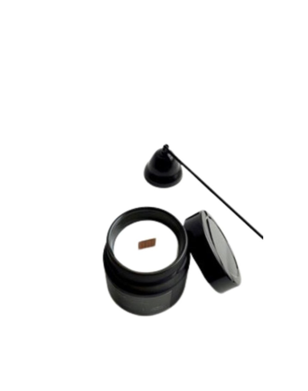 vela en envase de vidrio con tapa