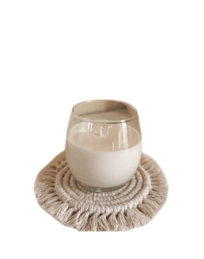 vela en envase de vidrio