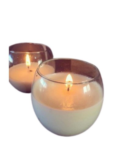 vela en envase de vidrio