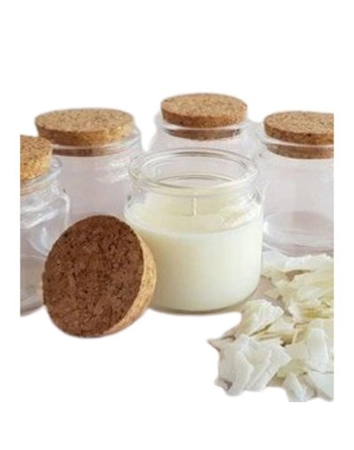 vela en envase de vidrio con tapa corcho