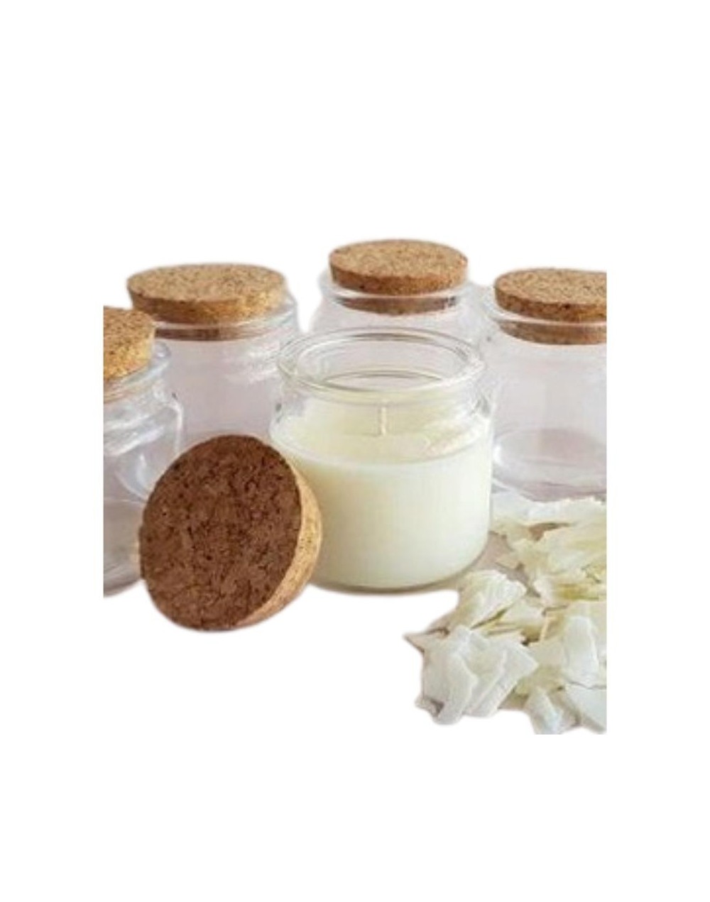 vela en envase de vidrio con tapa corcho