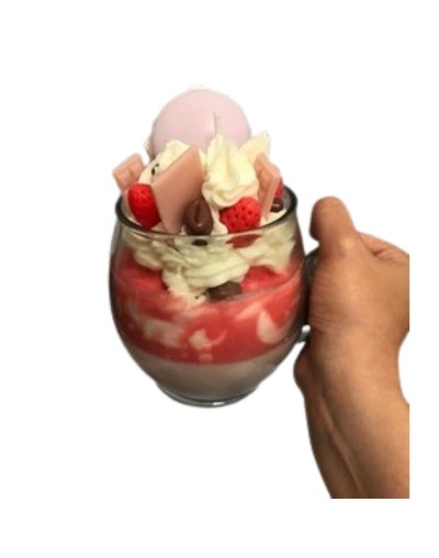 vela en envase de vidrio tipo postre