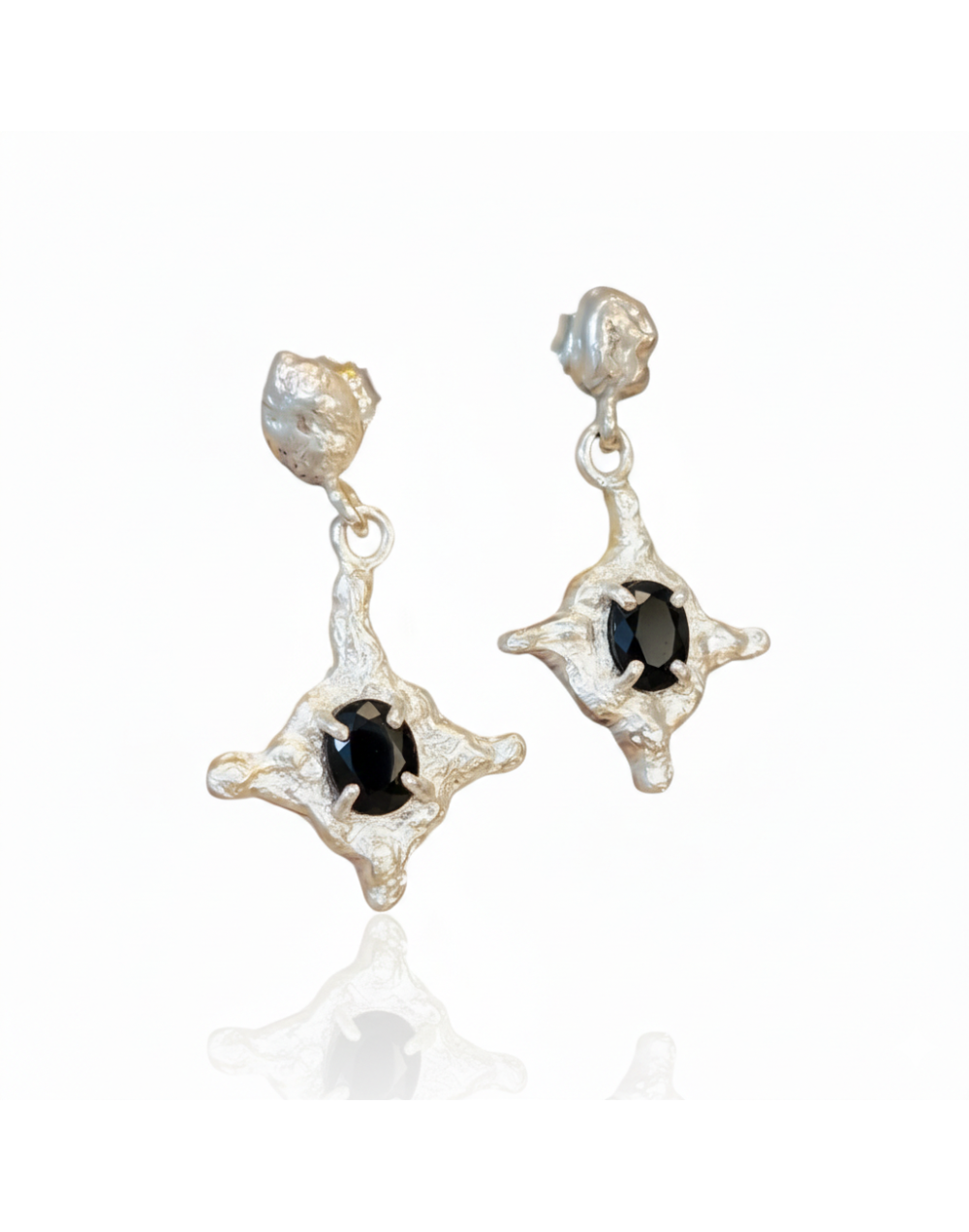 Aretes estrella con granate 