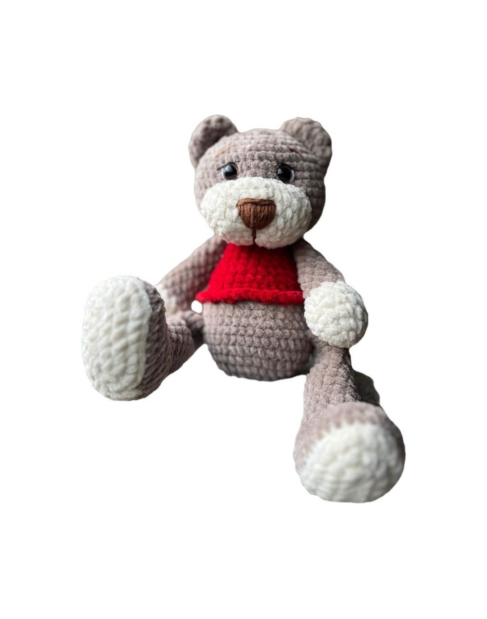 Oso tejido a mano en técnica amigurumi, elaborado con material afelpado de alta calidad que le brinda una textura suave y agrada