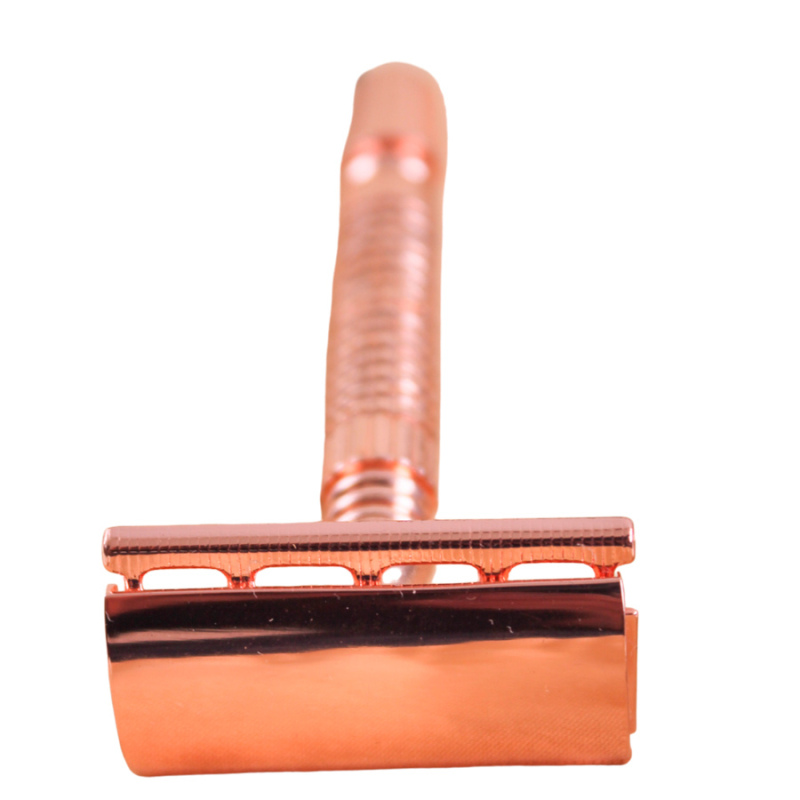 Máquina de afeitar en acero inoxidable color oro rosa