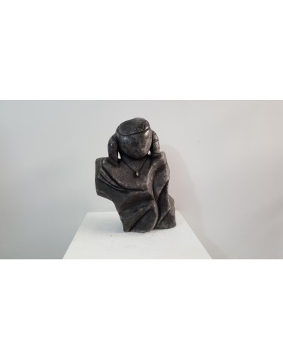 Escultura tallada en roca salinaNiña Muisca