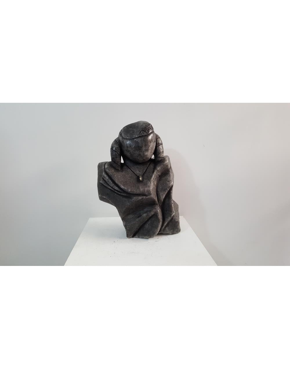 Escultura tallada en roca salinaNiña Muisca