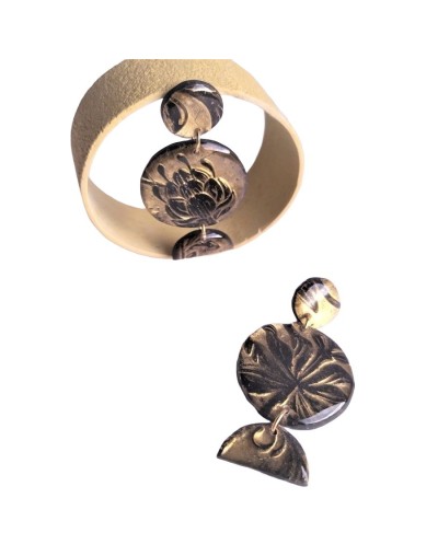 Aretes polvo dorado con flor