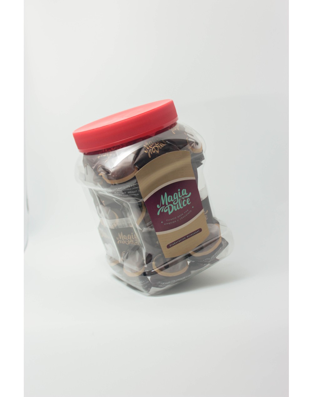 Tarro por 30 unidades Ciruelas pasas con arequipe y chocolate