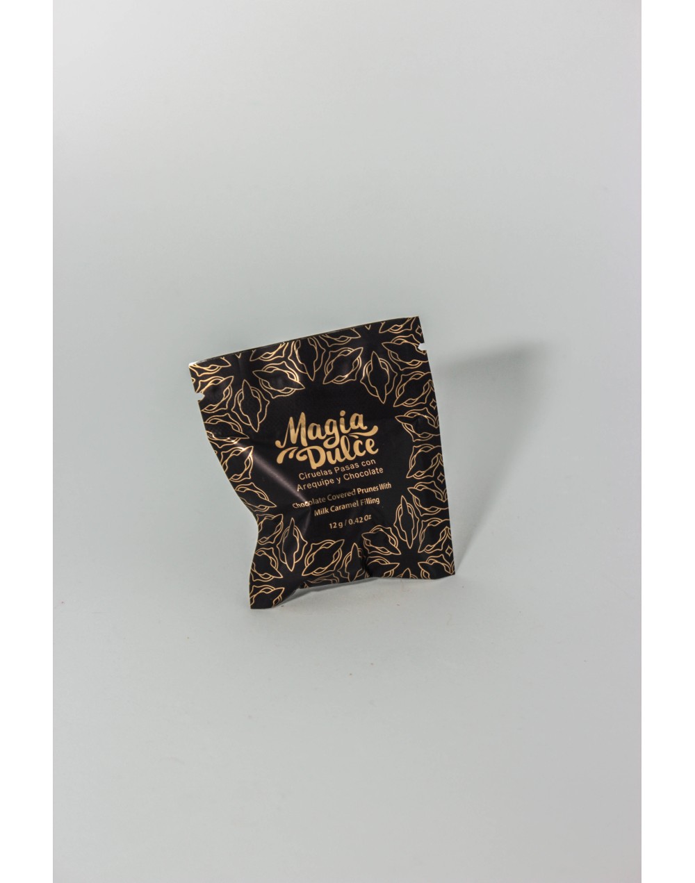 Ciruela pasa con arequipe de café y chocolate