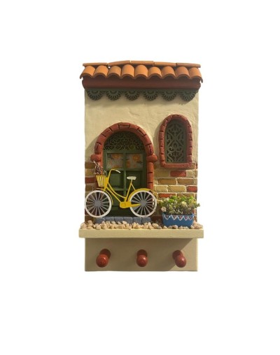 Fachadas para colgar llaves con pared lisa