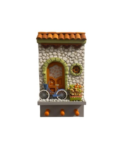 Fachadas para colgar llaves con pared piedra