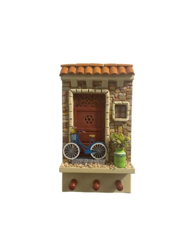Fachadas para colgar llaves con pared piedra