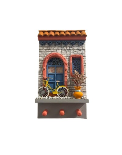 Fachadas para colgar llaves con pared piedra