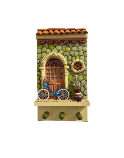 Fachadas para colgar llaves con pared piedra