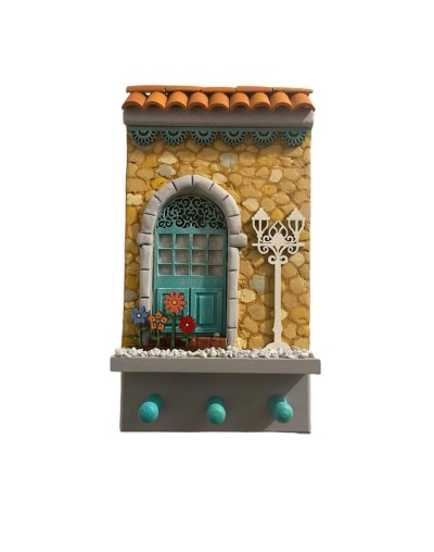 Fachadas para colgar llaves con pared piedra