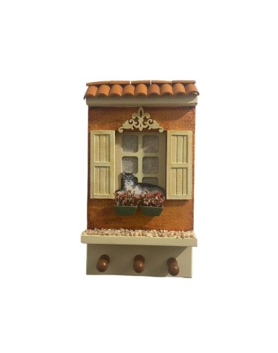 Fachada para colgar llaves con gato