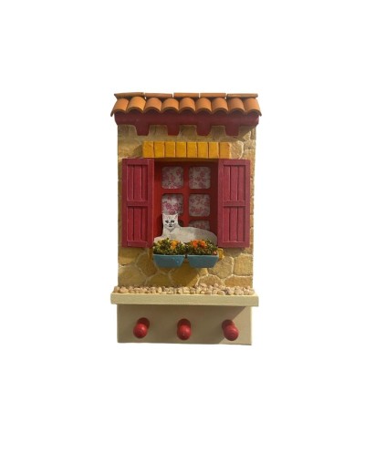 Fachada para colgar llaves con gato