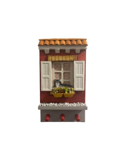Fachada para colgar llaves con gato