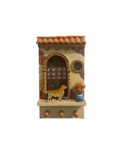 Fachada para colgar llaves con perro