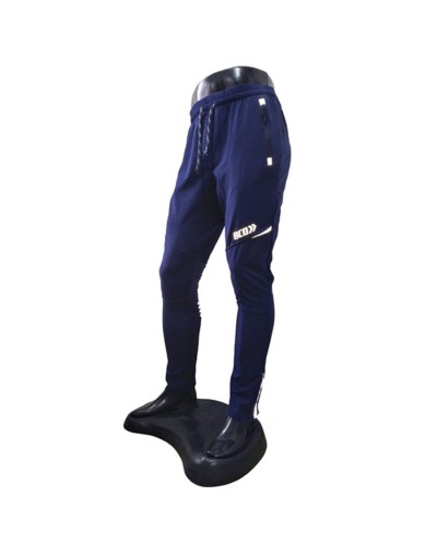 Pantalón deportivo cortavientos hombre multideporte azul