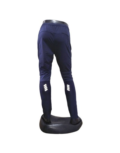 Pantalón deportivo cortavientos hombre multideporte azul