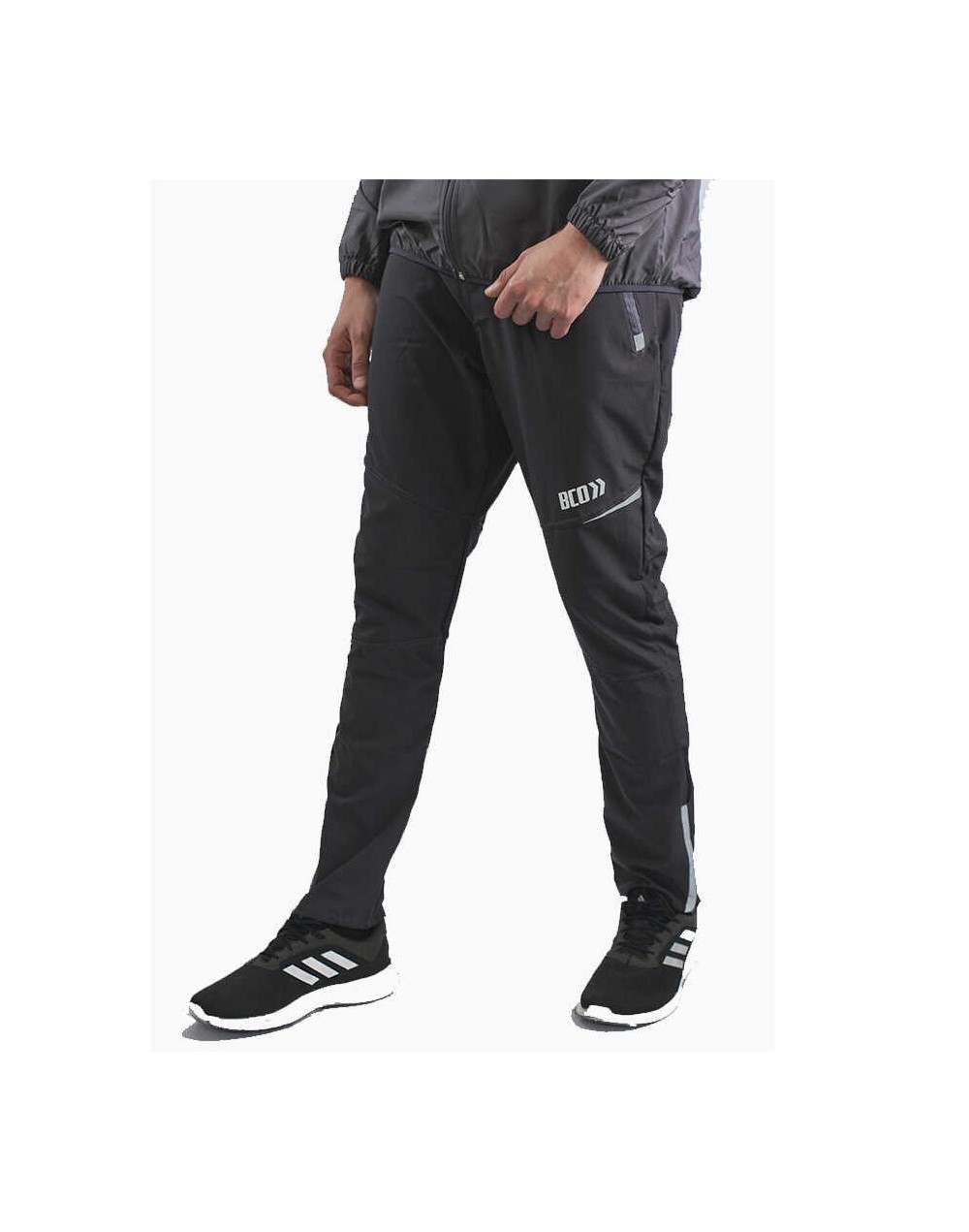 Pantalón deportivo cortavientos hombre multideporte gris ratón