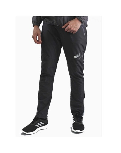 Pantalón deportivo cortavientos hombre multideporte gris ratón