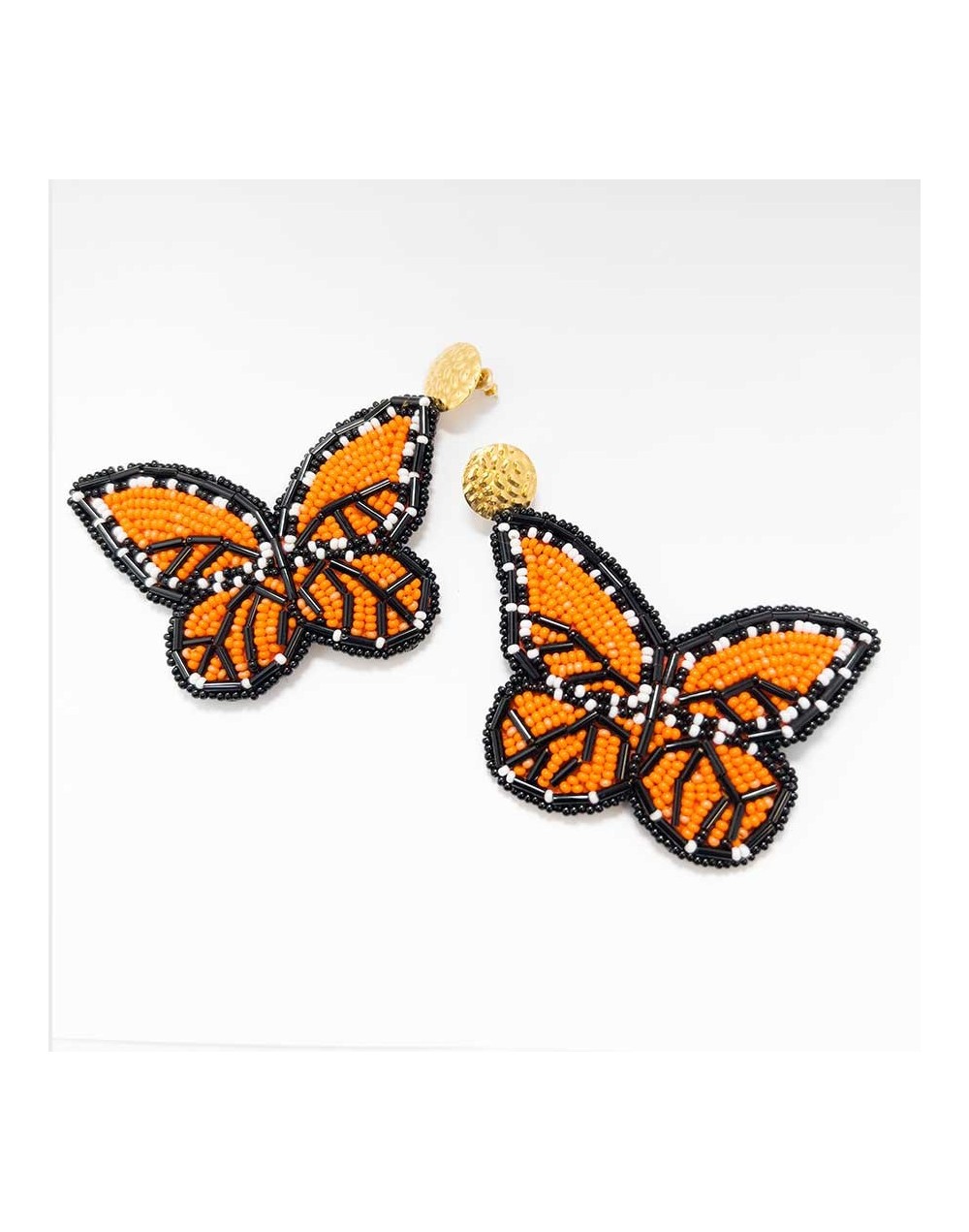 Aretes mariposas tejidos en miyuki