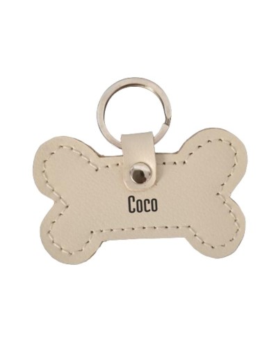 Llavero de Cuero Artesanal  Hueso - Sostenibilidad y Amor por las Mascotas