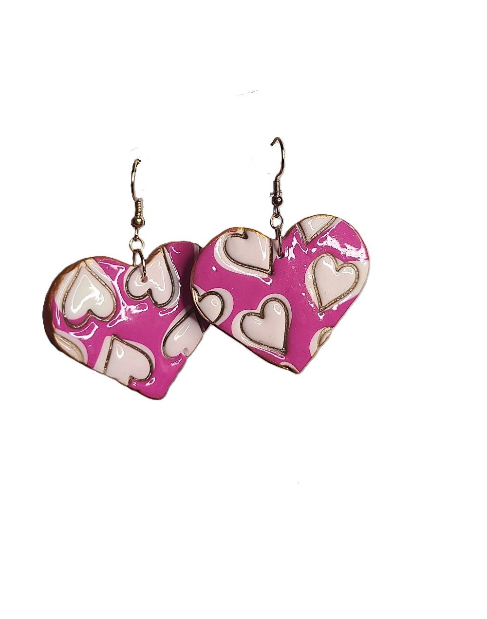 Aretes  corazón fucsia 