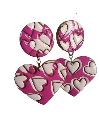 Aretes fucsia corazón y circulo.
