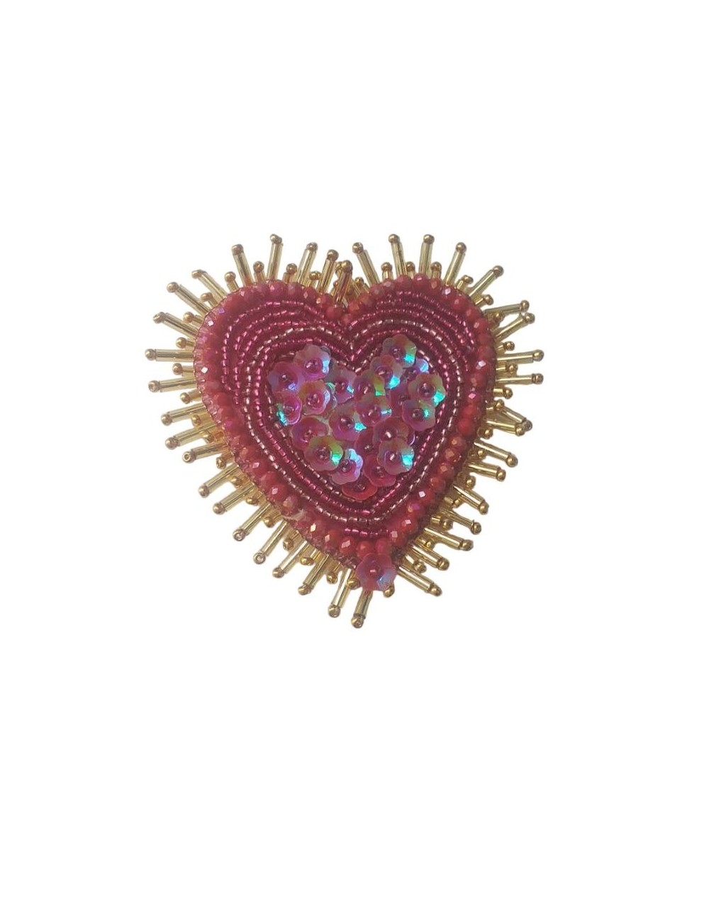 Broche corazón resplandor