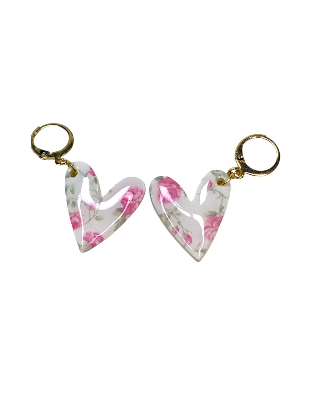 Aretes blancos estampado rosa